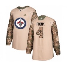 Men Winnipeg Jets #4 Neal Pionk Authentic Camo Veterans Day Practice Hockey Stitched Jersey